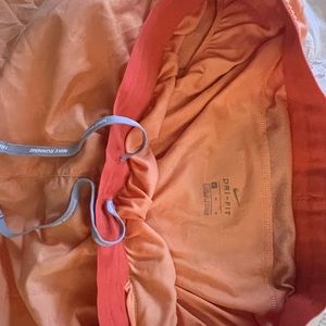 Orange nike shorts